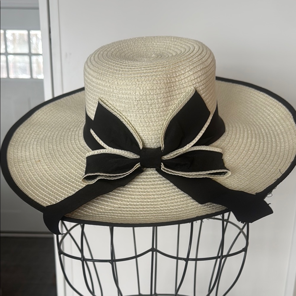 Elegant Straw Hat with Black Ribbon